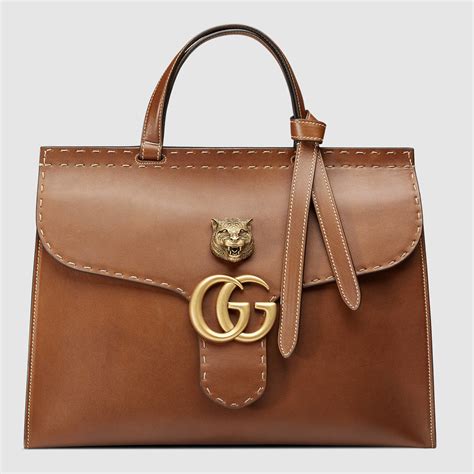 gucci kids logo brown leather thong|gucci leather handbags.